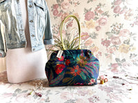 Atenti Floral Molly handbag with embroidered botanical design, chartreuse handles and trim, and organized lined interior