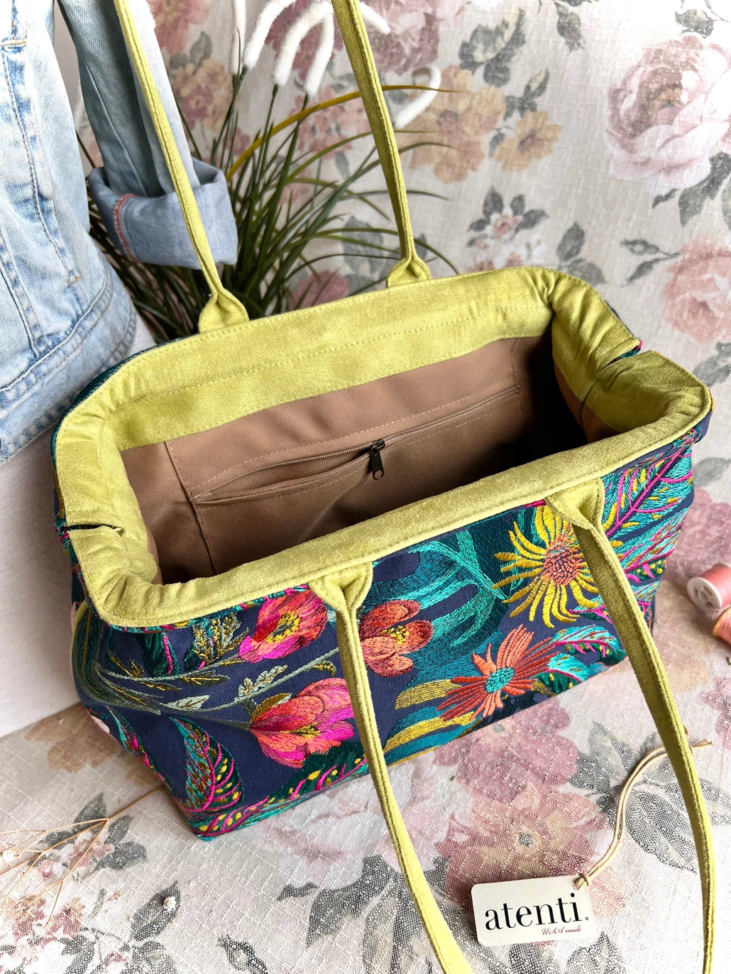 Atenti Floral Molly handbag with embroidered botanical design, chartreuse handles and trim, and organized lined interior