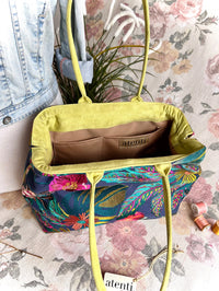 Atenti Floral Molly handbag with embroidered botanical design, chartreuse handles and trim, and organized lined interior