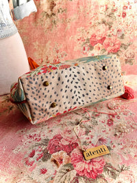 Atenti Gemma Molly handbag with vintage-inspired floral print, rust-colored double handles, spotted frame trim, and organized lined interior
