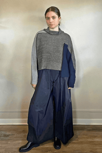 Moyuru 46332G Grey Combo pullover sweater with asymmetric grey and deep blue knit panels