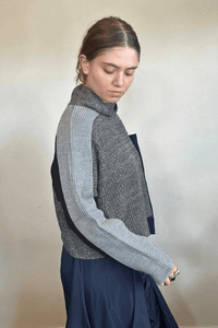 Moyuru 46332G Grey Combo pullover sweater with asymmetric grey and deep blue knit panels