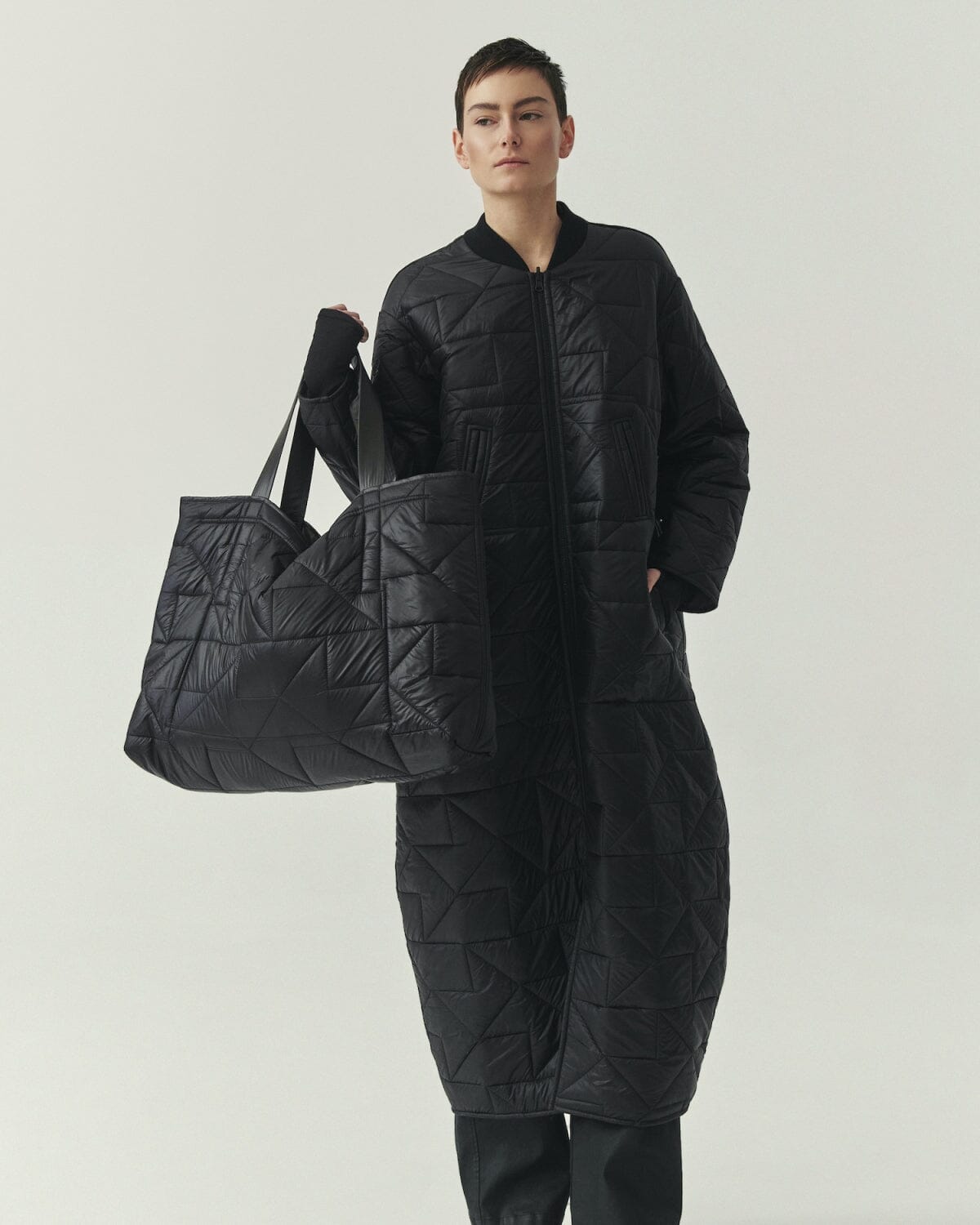 Kedziorek 5502 longline reversible quilted coat in Black and Olive, front, back and alternate styling views