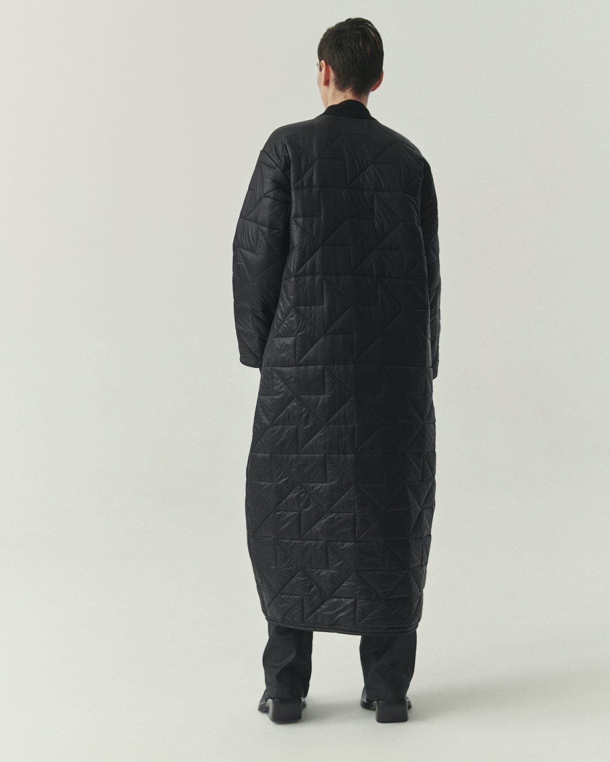 Kedziorek 5502 longline reversible quilted coat in Black and Olive, front, back and alternate styling views