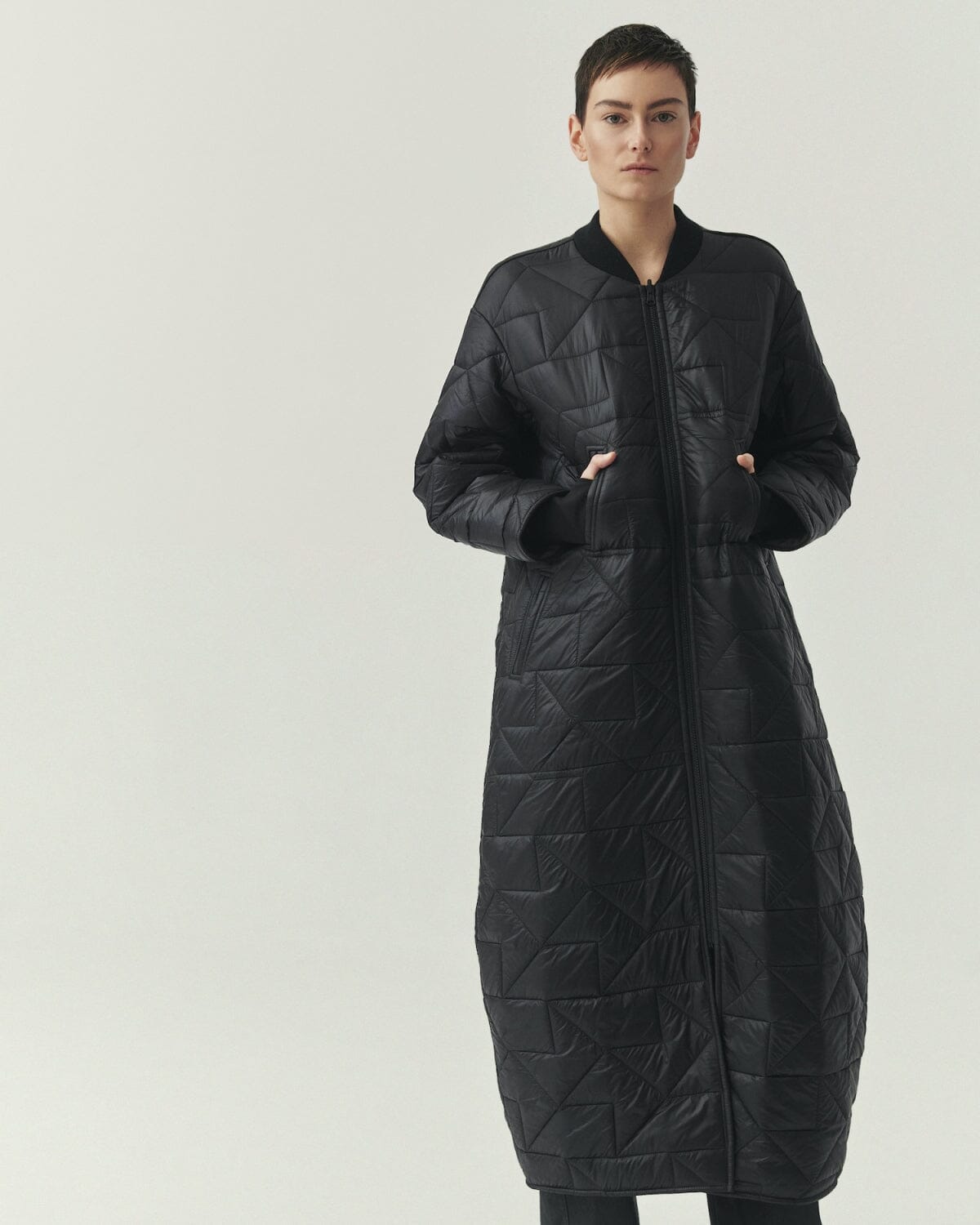 Kedziorek 5502 longline reversible quilted coat in Black and Olive, front, back and alternate styling views