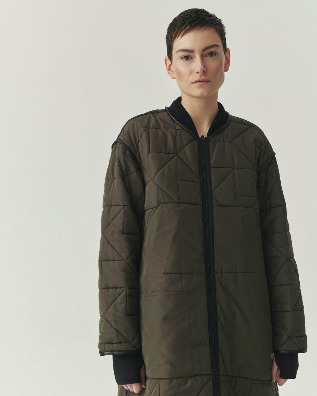 Kedziorek 5502 longline reversible quilted coat in Black and Olive, front, back and alternate styling views