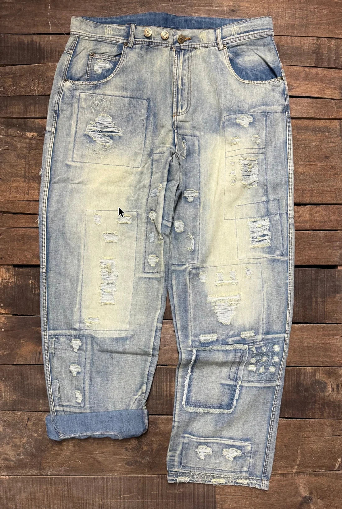 Jaded Gypsy Denim Peace And Love Jeans with distressed patchwork details, faded blue wash, embroidered back design, and rolled cuffs