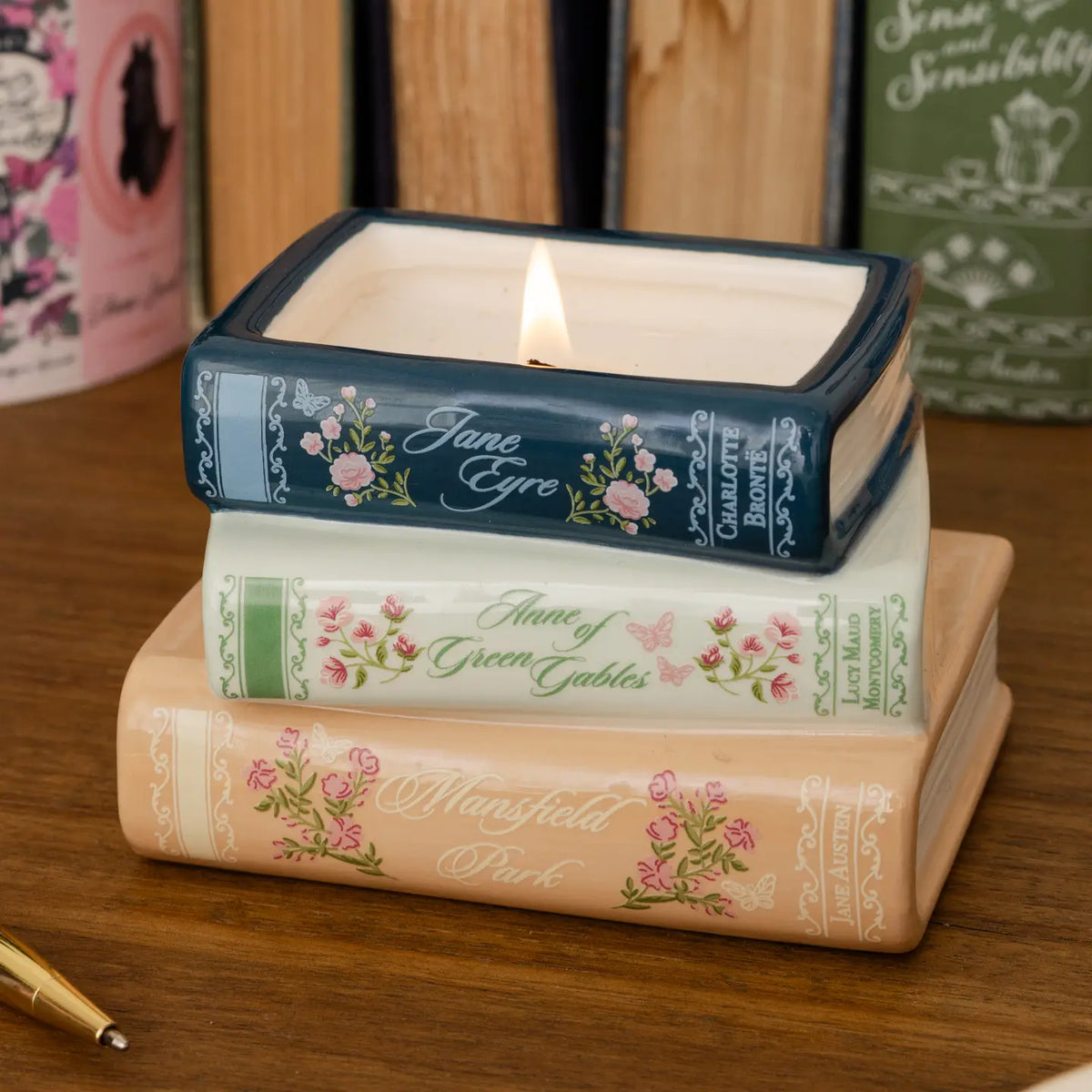 Steel Mill & Co. Ladies of Literature Stacked Books Candle featuring Jane Eyre, Anne of Green Gables, and Mansfield Park
