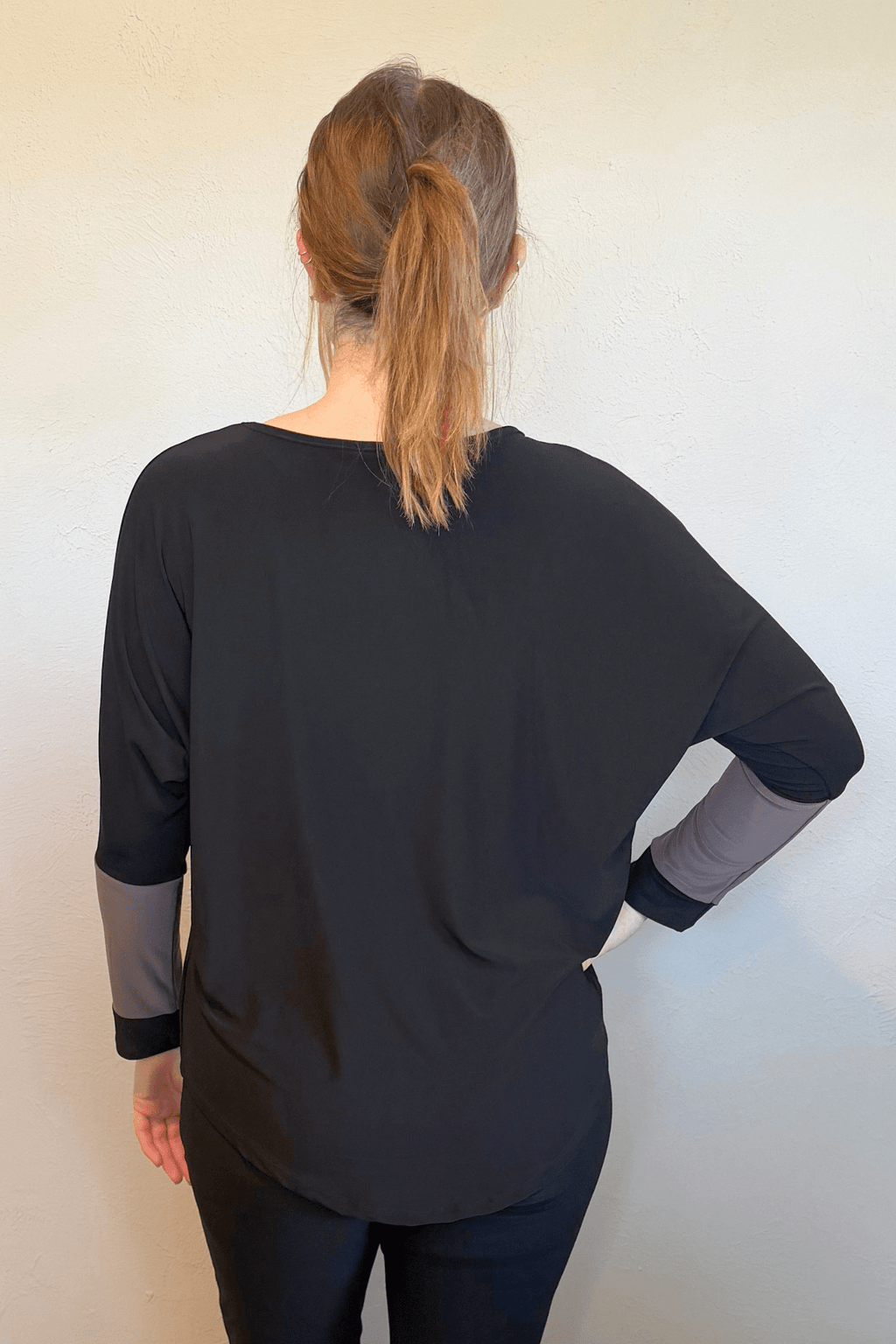 Kozan Tessa Top in Black and Grey, front and back views