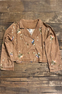 Brown cropped cotton jacket with floral embroidery, paint-splatter detailing, notched lapel collar, button front, and long sleeves with cuff tabs; back view shows center seam and Jaded Gypsy patch.