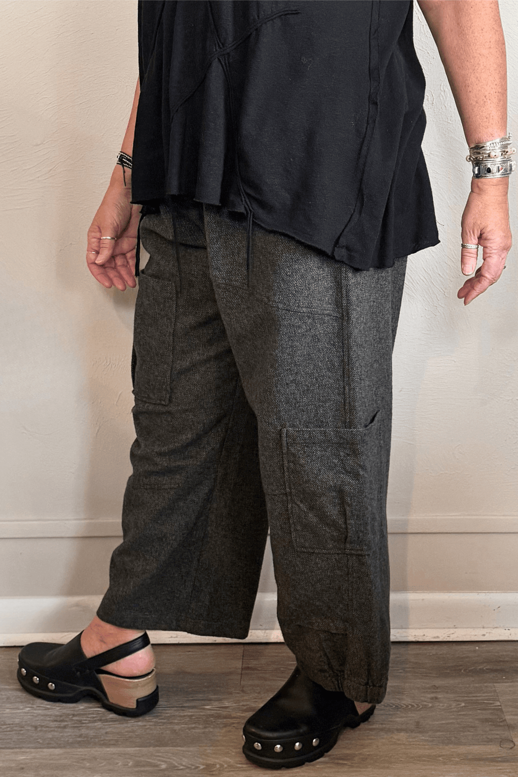 Bodil Collection AN2216 Tweed Pant in charcoal grey with asymmetrical cargo-style patch pockets, front side and back views