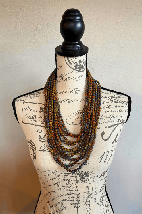 Jianhui 5 Strand UFO Bead Necklace styled in Gold, Silver, and Autumn